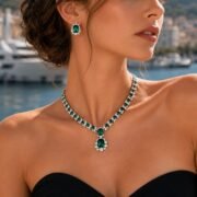 Woman wearing SIGLO green gemstone statement necklace