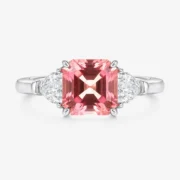 Sunset Dream Padparadscha three stone ring with a 2.4ct pink-orange center stone