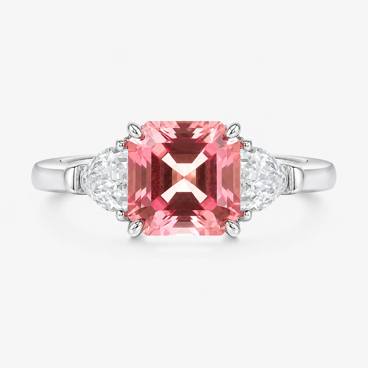 Sunset Dream Padparadscha three stone ring with a 2.4ct pink-orange center stone