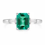 Emerald Grace Three Stone Emerald Ring with a 1.44ct green center stone
