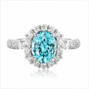 Royal Tide Paraiba Pavé Halo Ring with a 3.23ct oval center stone