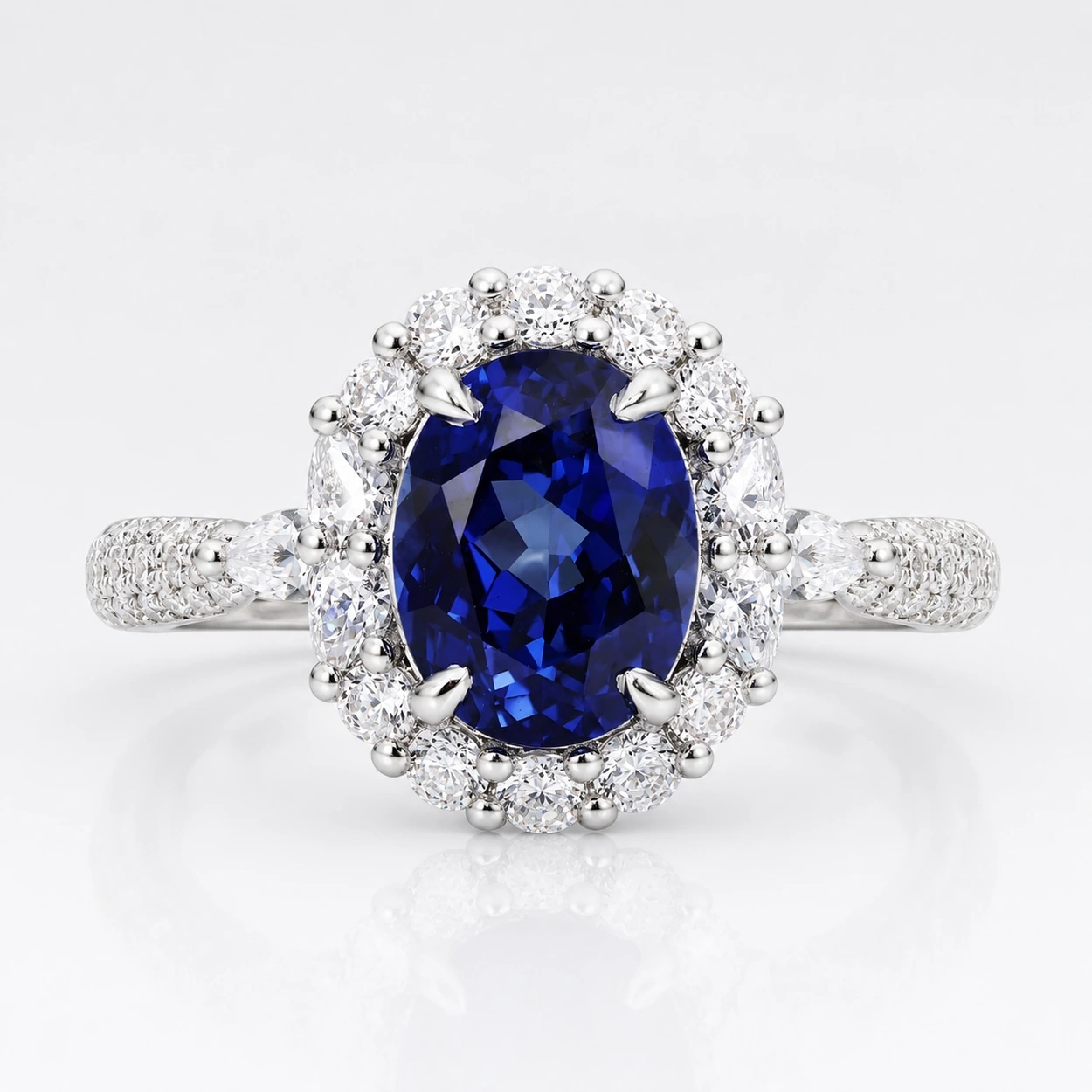 Royal Blue Sapphire Halo Ring with a 2.675ct center stone