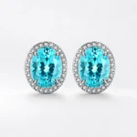 Oval lab-grown Paraiba gemstone stud earrings with sparkling halo