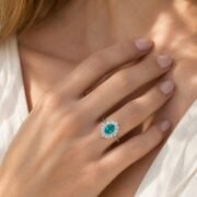 Close-up of SIGLO Aurora Tide teal lab-grown diamond ring on hand