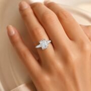 Woman wearing SIGLO 3ct emerald-cut lab-grown diamond ring
