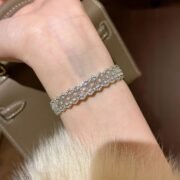 Close-up of SIGLO S925 sterling silver bracelet on wrist