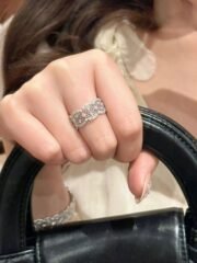 Woman wearing SIGLO sparkling S925 sterling silver statement ring