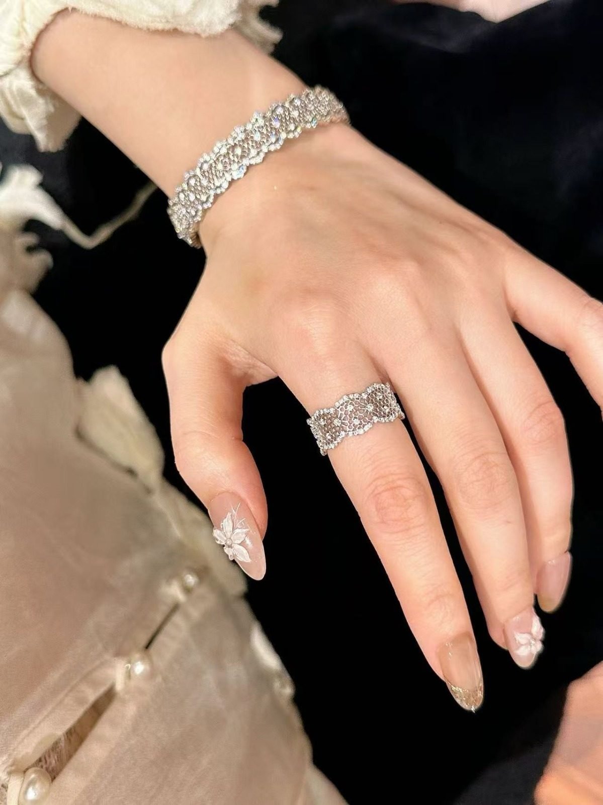 Woman wearing SIGLO sparkling S925 sterling silver statement ring