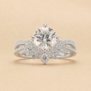 Front view of a round floral double pavé diamond ring