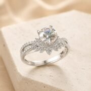 45-degree view of a round brilliant floral pavé ring