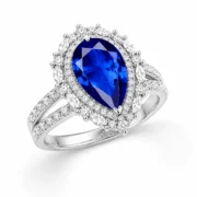 Pear cut sapphire ring 45 degree view with double pave band