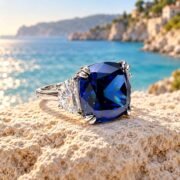 Elegant model wearing a lab-grown blue diamond statement ring