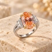 45-degree view of an oval orange lab-grown diamond ring