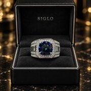Male model wearing a blue moissanite statement ring in S925 silver