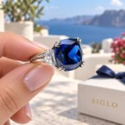 45-degree view of a cushion-cut blue diamond ring