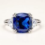 Front view of Midnight Sovereign 12ct Blue Diamond Ring cushion-cut-blue-diamond-ring-45-degree.webp