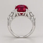 Side profile of the red gemstone ring showing its setting and wide geometric band