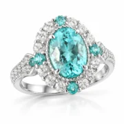 45-degree view of the oval blue-green gemstone halo ring