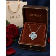 Ocean Luck four leaf clover necklace arranged with its delicate silver chain