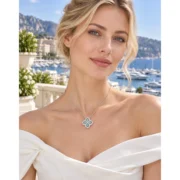 Model wearing the Ocean Luck blue clover necklace on a 45cm silver chain