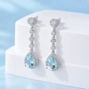 Sky Serenade Blue Topaz Dangle Earrings - Image 5
