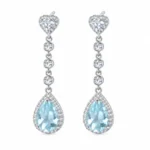 Blue topaz dangle earrings with heart-shaped tops, three round connecting accents and pear-shaped halos in S925 silver