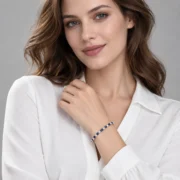 Model wearing the 6.69-inch Midnight Promise sapphire tennis bracelet