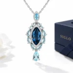 London blue topaz necklace with a marquise center, pale blue accents and a teardrop detail in S925 silver