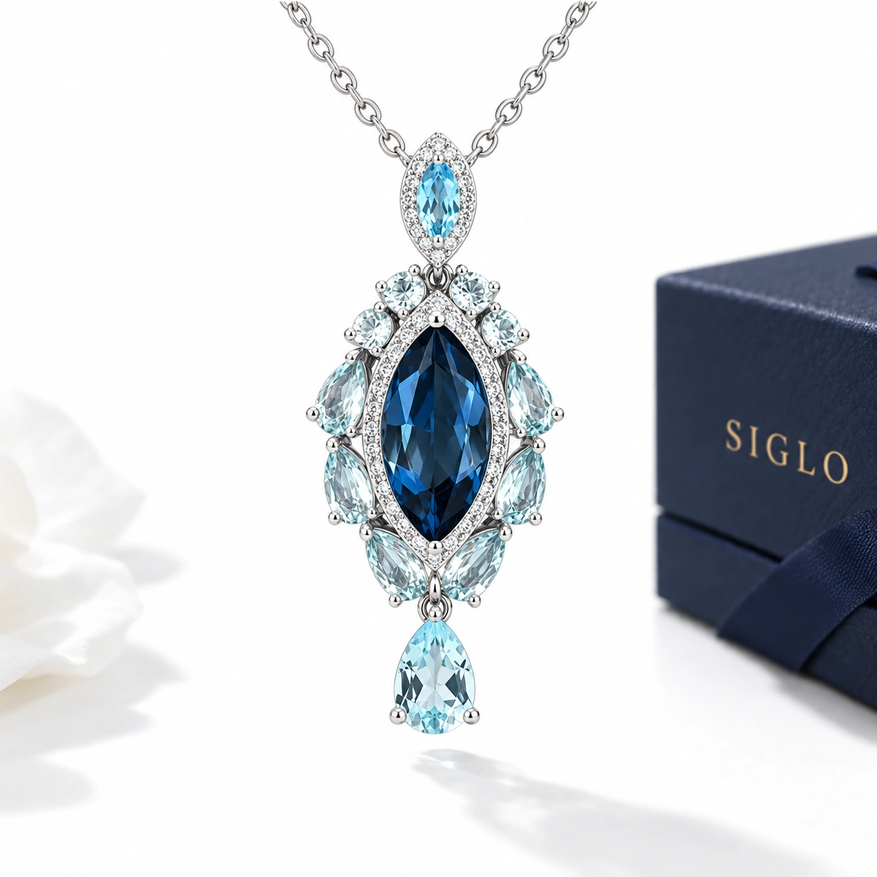 London blue topaz necklace with a marquise center, pale blue accents and a teardrop detail in S925 silver
