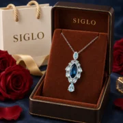 Midnight Cascade London blue topaz necklace arranged in an elegant jewelry display