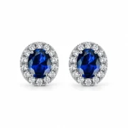 Sapphire halo stud earrings with oval deep blue centers and sparkling accents in S925 sterling silver
