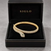 Golden Instinct snake bangle bracelet presented in a SIGLO gift box