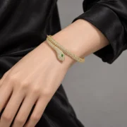 Model wearing the Golden Instinct S925 silver snake bangle bracelet