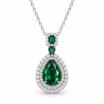 Emerald teardrop necklace with a multi-row sparkling halo and two green accent stones in S925 silver
