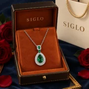 Enchanted Forest emerald teardrop necklace presented in a SIGLO jewelry gift box