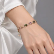 Model wearing the Color Reverie adjustable tourmaline bracelet