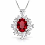 Ruby halo necklace with an oval red center, radiating diamond accents and a pear-shaped upper stone in S925 silver