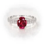 Oval red diamond ring with a four-prong setting and sparkling S925 silver band