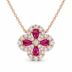 Ruby clover necklace with four pear-shaped red stones and sparkling borders in gold-tone S925 silver