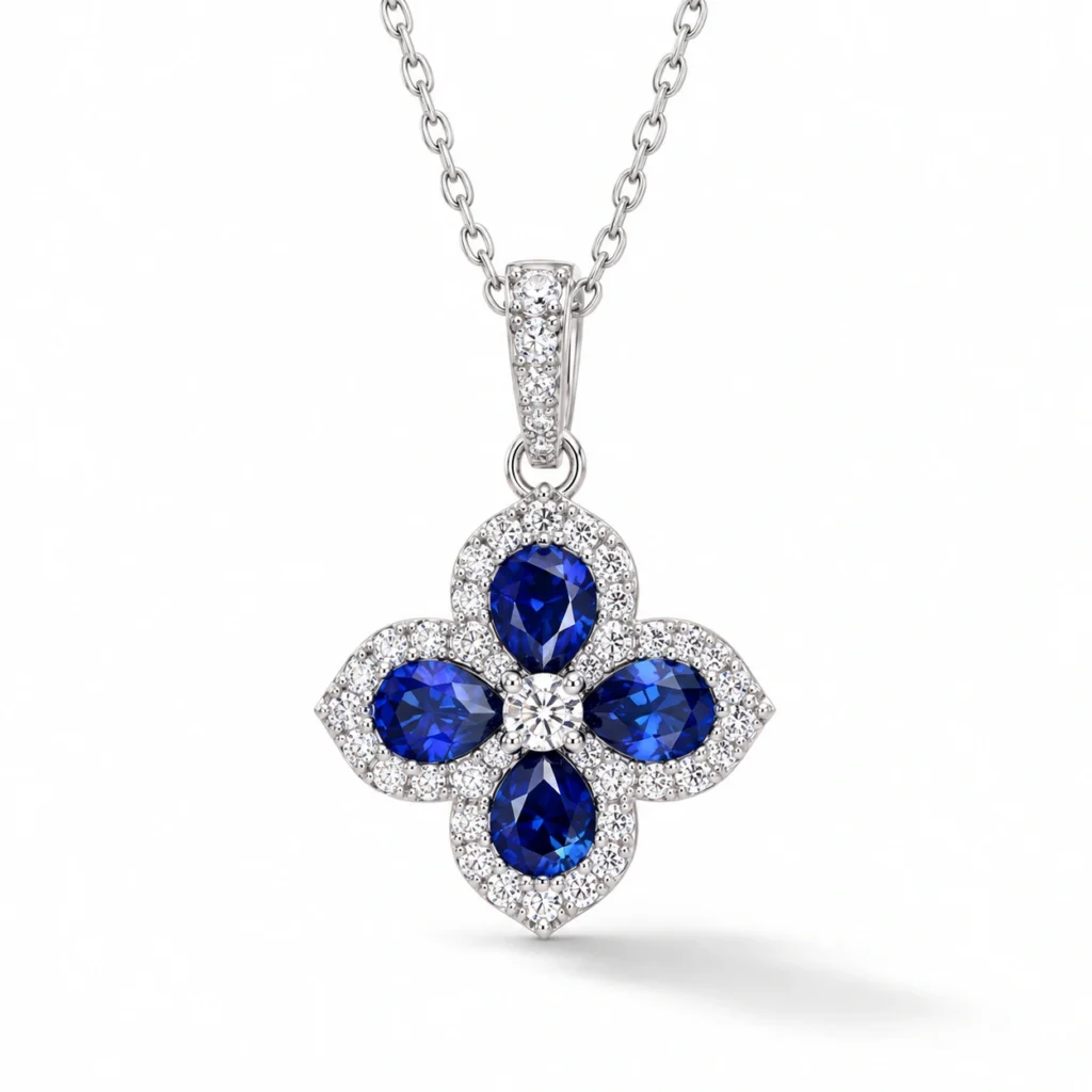 Sapphire clover necklace with four deep blue pear-shaped stones and sparkling halos in S925 silver