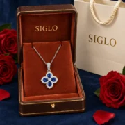 Blue Fortune sapphire four leaf clover necklace presented in a SIGLO jewelry gift box
