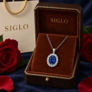 Classic Blue sapphire halo necklace presented in a SIGLO jewelry gift box