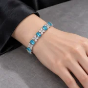 Ocean Wings blue stone and butterfly bracelet in a styled jewelry display