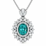 Ocean Majesty teal statement necklace with an oval center and floral halo in S925 silver