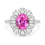Front view of the Pink Reverie pink cocktail ring with an oval center and sunburst halo