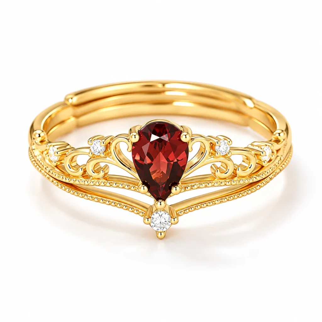 Crimson Reign garnet ring set with a pear-shaped natural garnet crown ring and matching accent band
