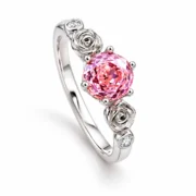 Angled view of the pink center stone and layered silver rose shoulders
